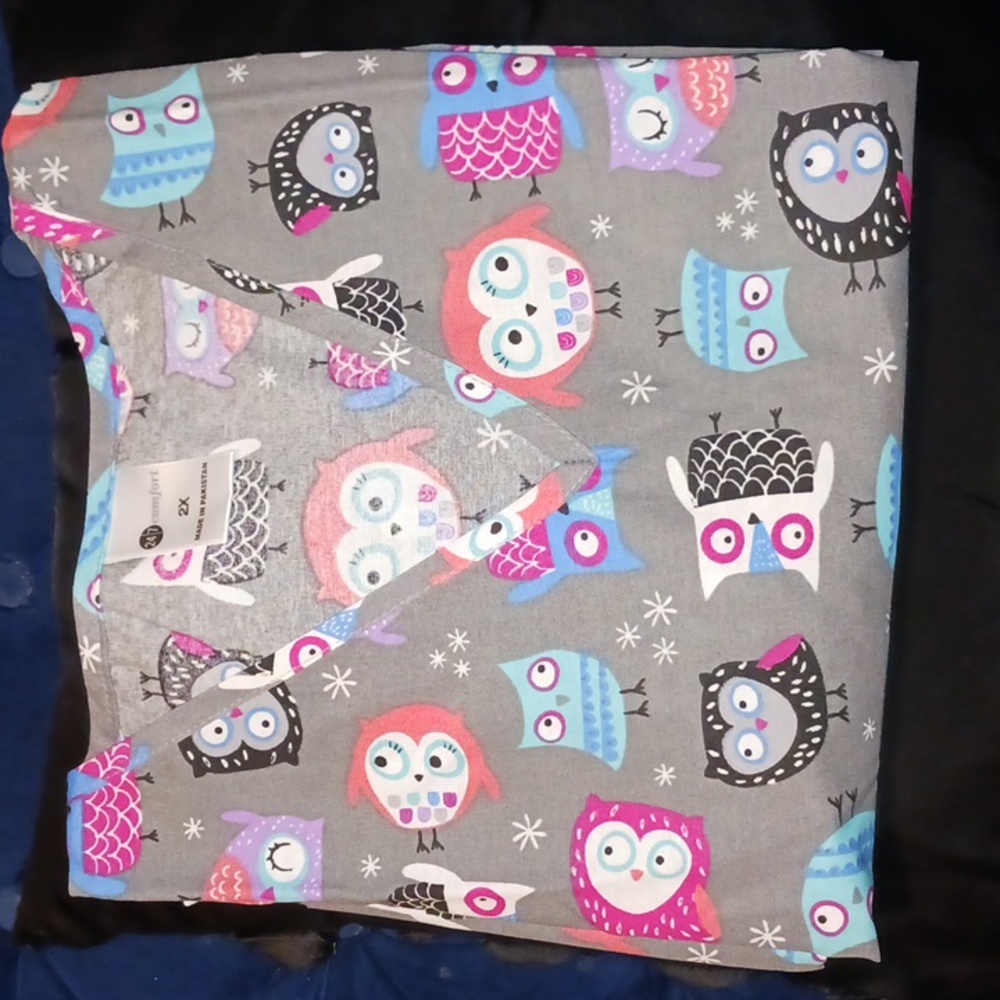 BRAND NEW SCRUB TOP NEVER WORN
